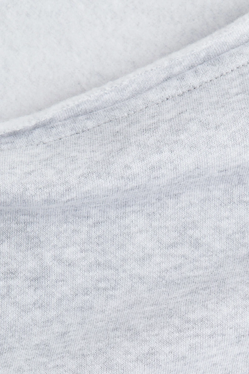 Chandail à épaules asymétriques