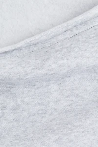 Chandail à épaules asymétriques