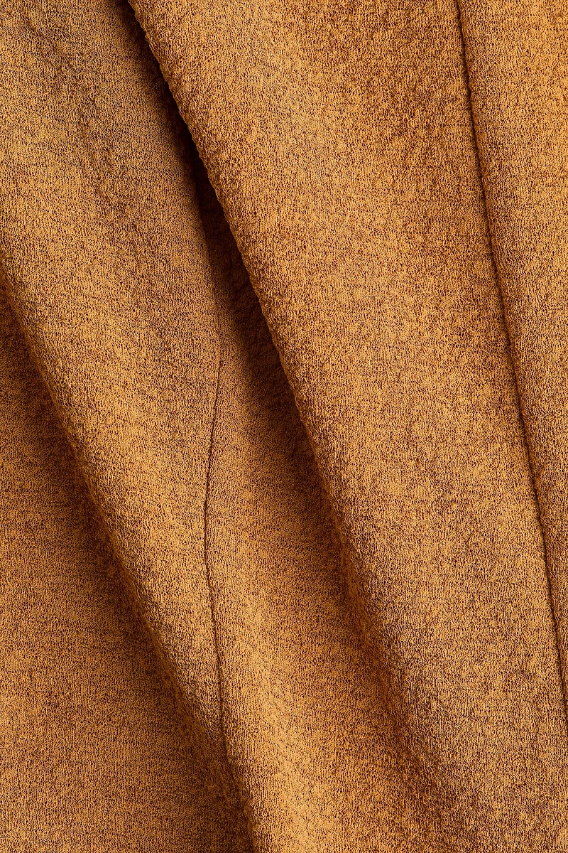 Sleeveless Peplum Top