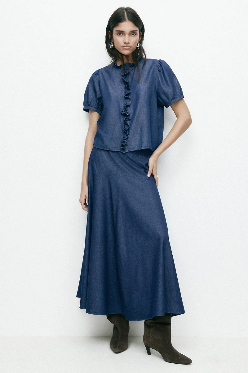 Blouse volantée en denim