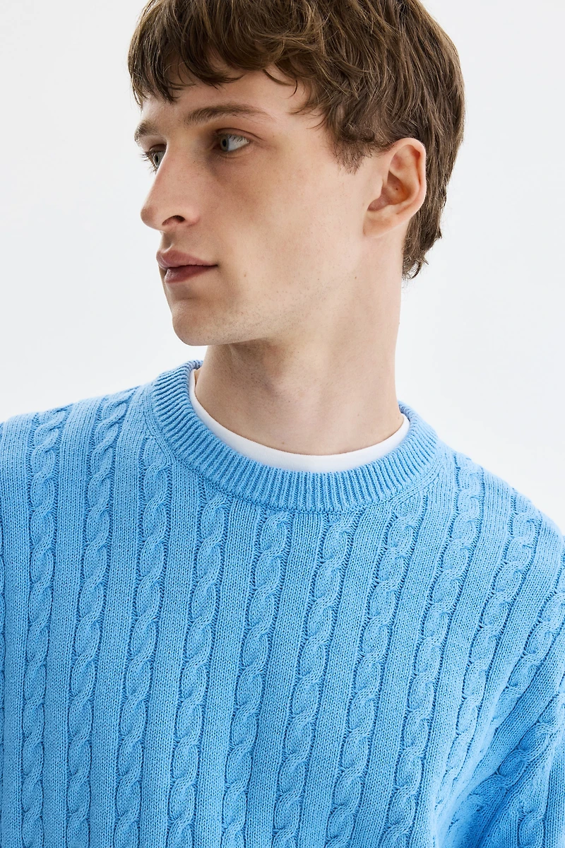 Chandail classique en tricot torsadé
