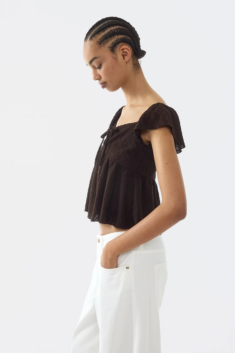 Blouse en jersey pointelle