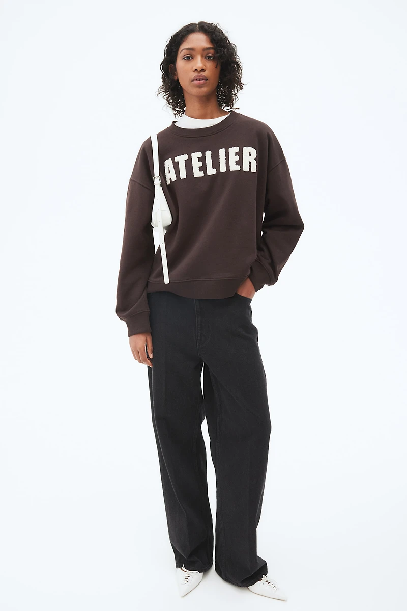 Sweatshirt with Text Motif