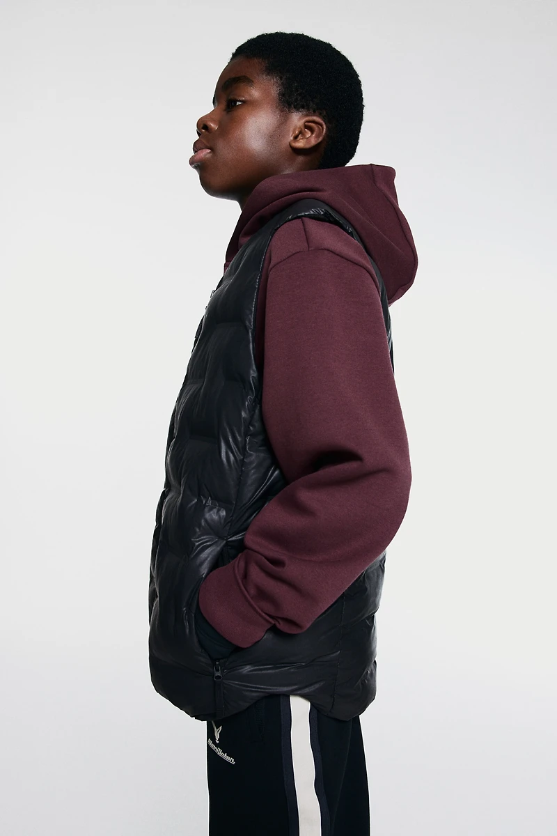 Veste de sport thermique sans manches ThermoMove™
