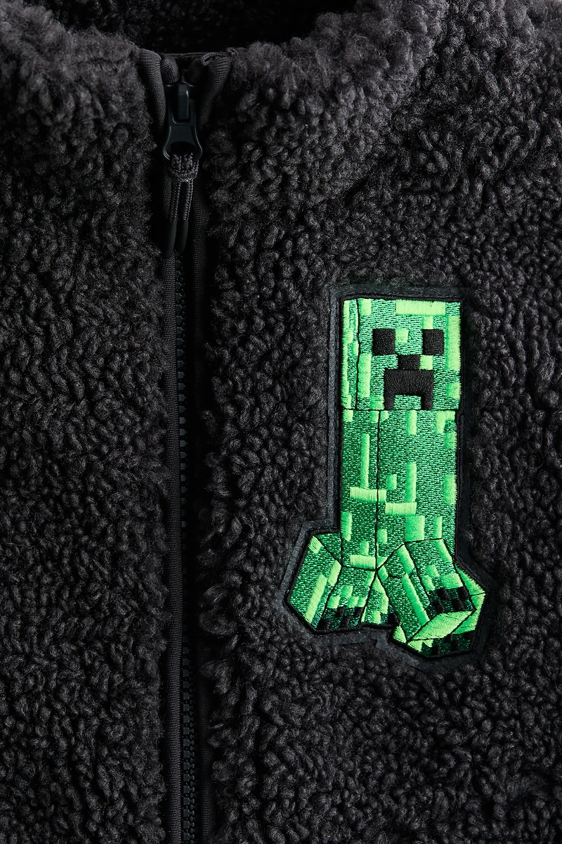 Veste sans manches en polar avec motif