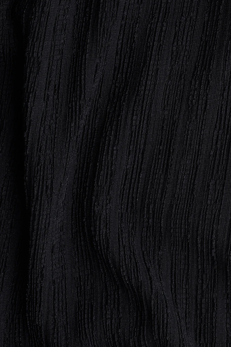 Combinaison pantalon à dos nu
