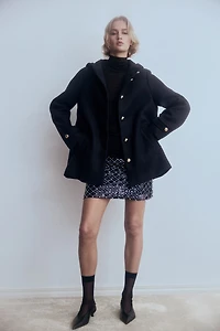 Manteau à capuche