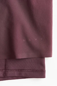 Short de sport superposé avec poche