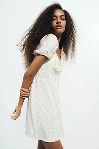 Robe à manches bouffantes