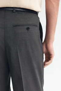 Pantalon sur mesure ample en laine mélangée