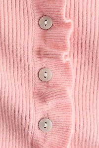 Chandail en tricot côtelé avec volants plissés