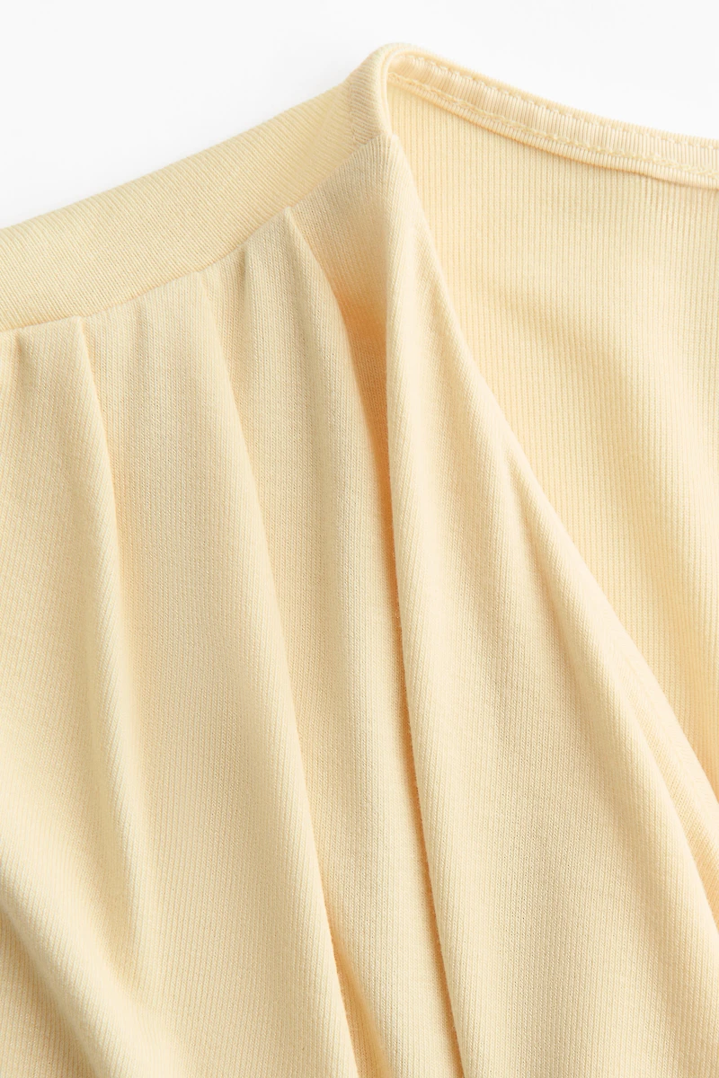 Draped Asymmetric Top