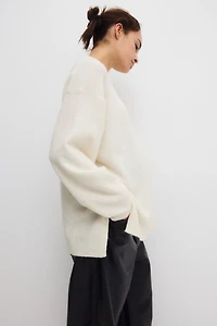 Chandail MAMA avec fentes latérales au bas