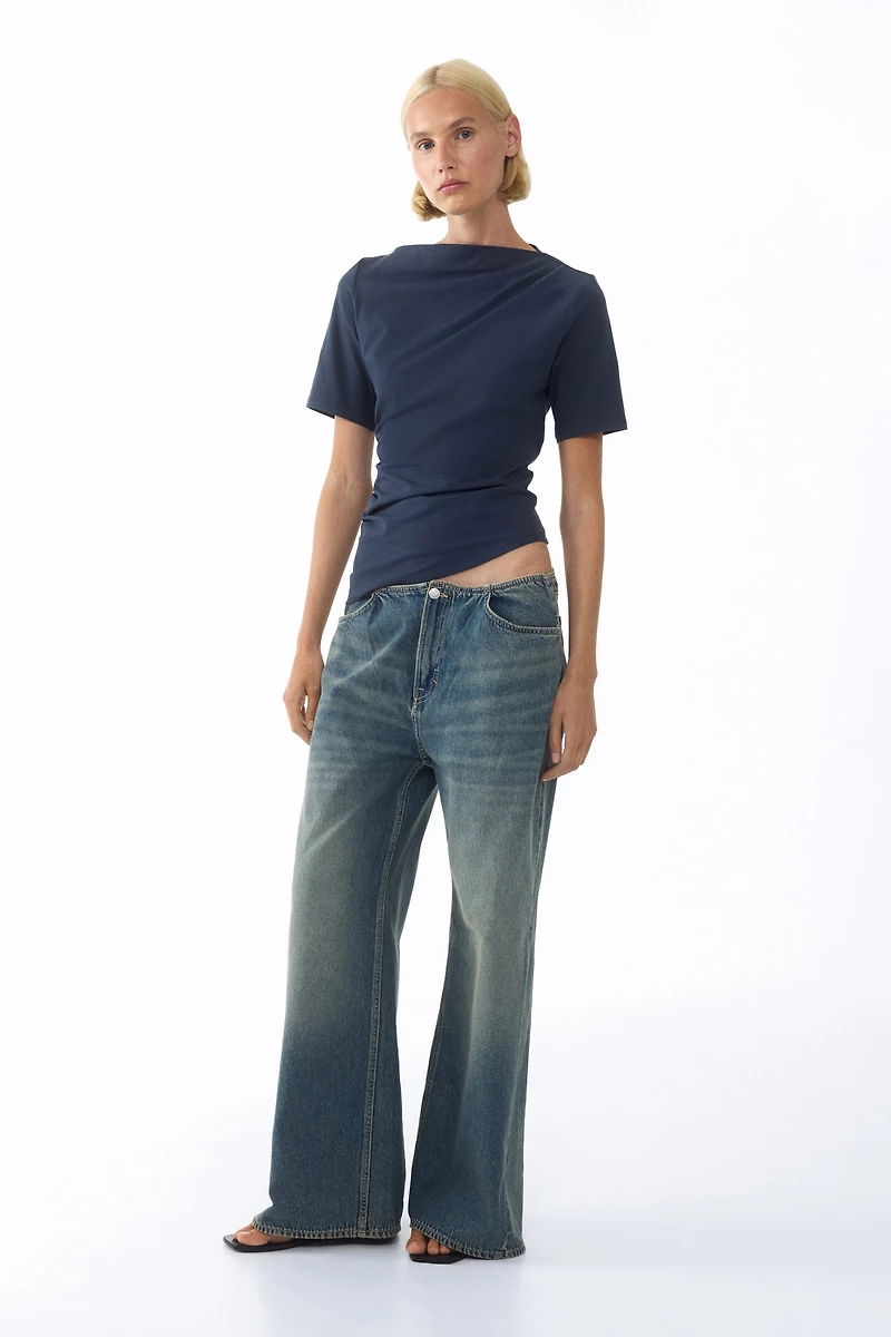 Draped Asymmetric Top