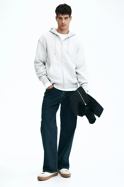 Veste à fermeture éclair ample capuche