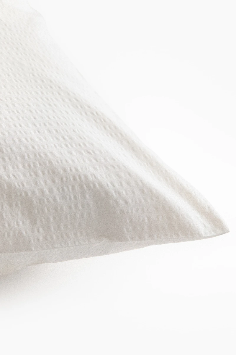 Taie d'oreiller en crépon de coton