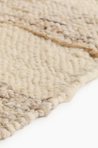 Grand tapis en tissu texturé de laine mélangée