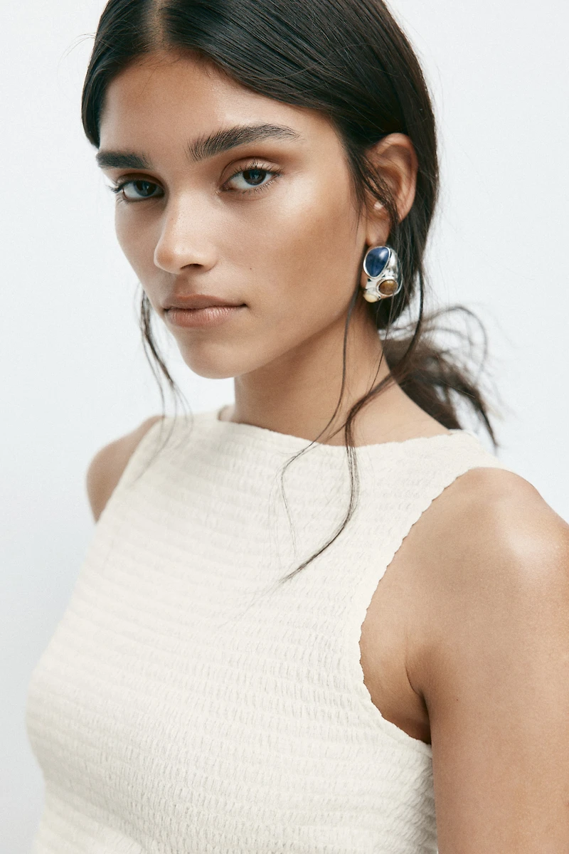 Haut nid d'abeille à encolure bateau