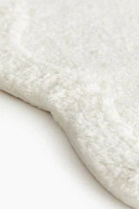 Tapis de bain en coton touffeté