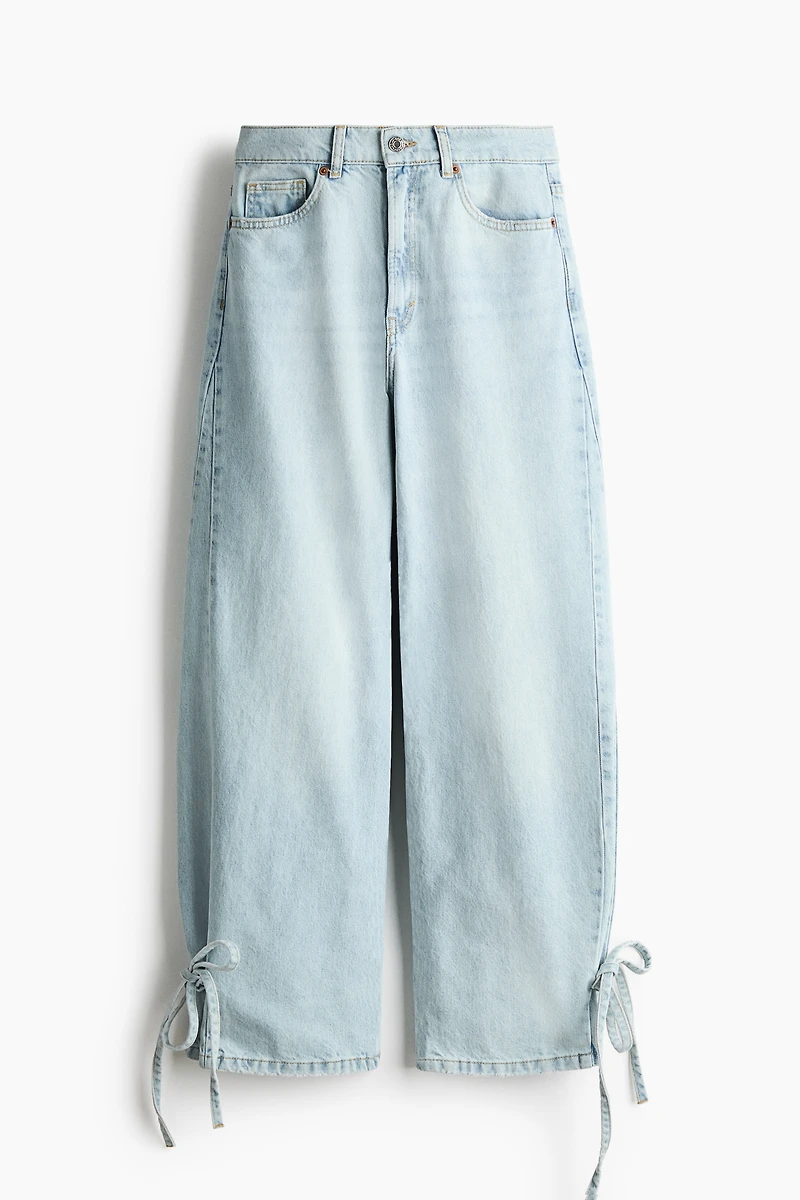 Jean taille haute jambes tonneau à la cheville