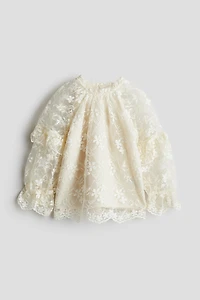 Blouse en dentelle