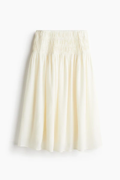 Jupe en crêpe avec taille smocks