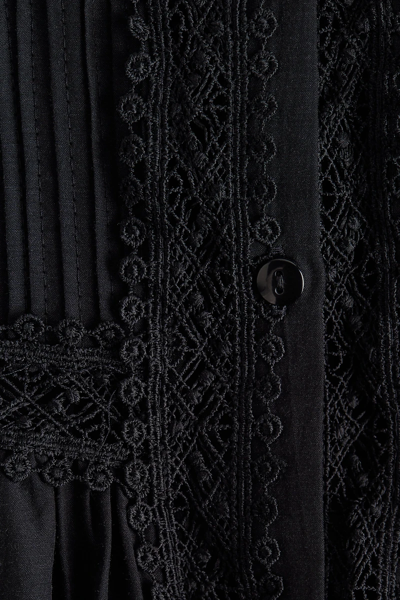 Blouse à plis nervurés