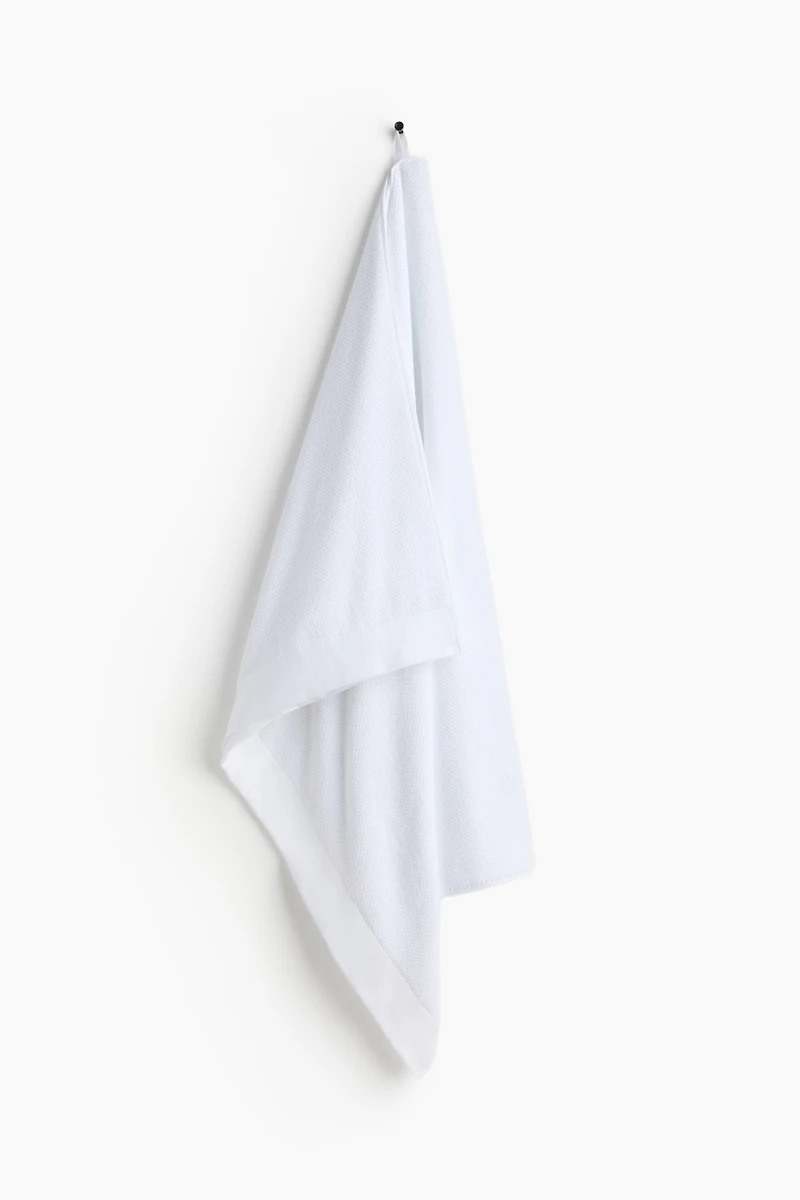 Serviette de bain en coton éponge