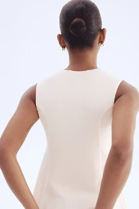 Interlock Sleeveless Peplum Top