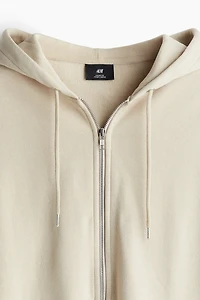 Veste à glissière Coupe Flottante avec capuchon