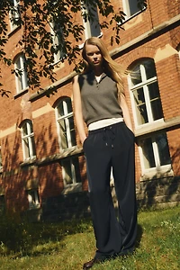 Pantalon de survêtement avec bandes latérales