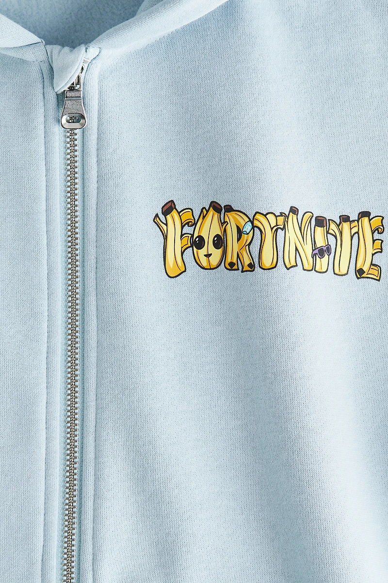 Veste à capuchon fermeture éclair avec motifs