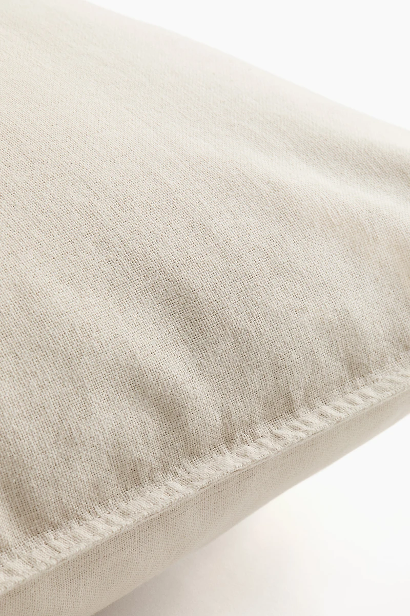 Housse de coussin en lin mélangé