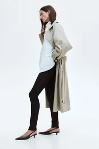 Pantalon à fermeture éclair au bas