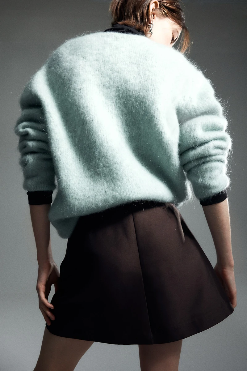 Minijupe avec boucle devant