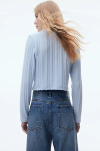 Gilet d'apparence tricot torsadé