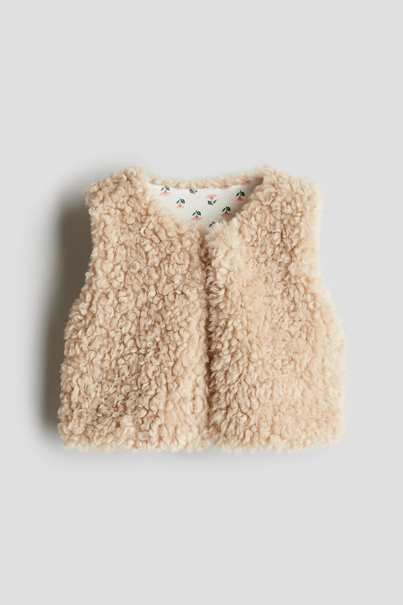 Veste sans manches duveteuse