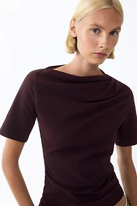 Draped Asymmetric Top