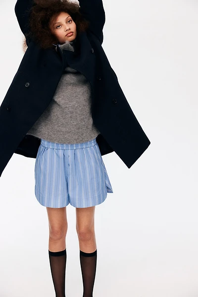Manteau au genou à double boutonnage