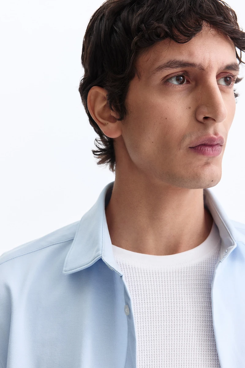 Chemise près du corps élastique dans les 4 sens