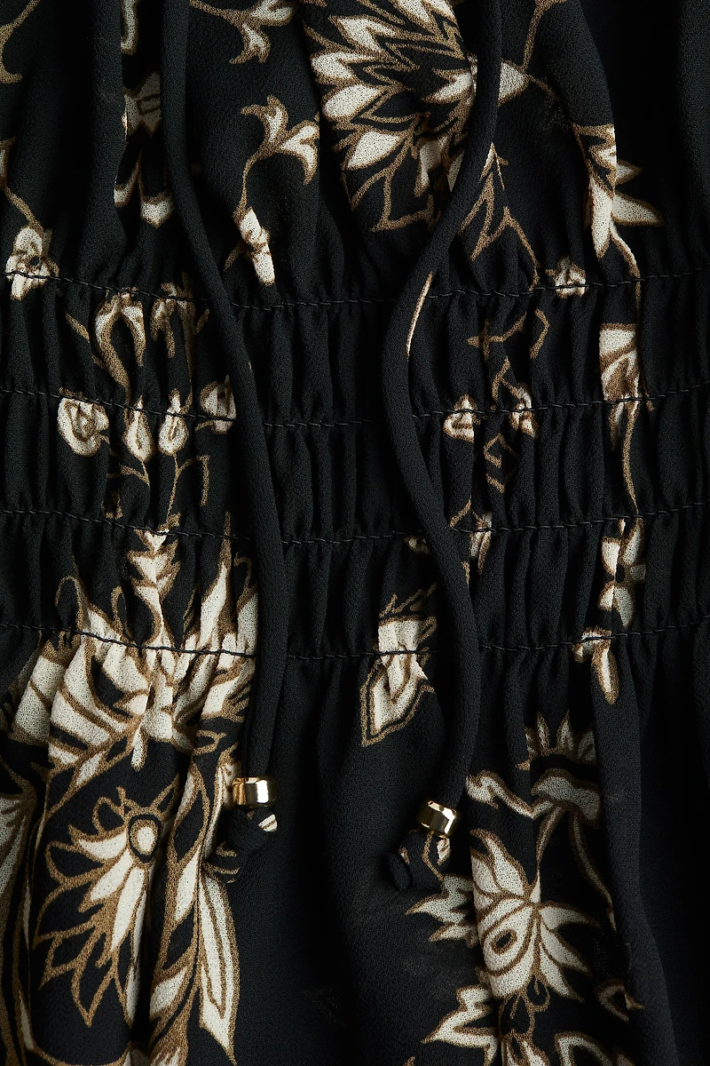 Blouse avec nid d'abeille