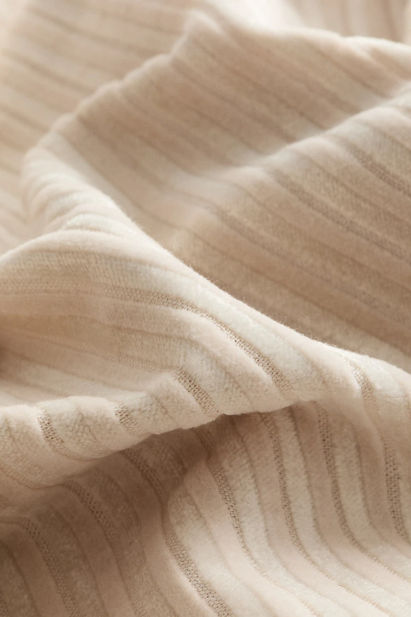 Housse de coussin en velours côtelé