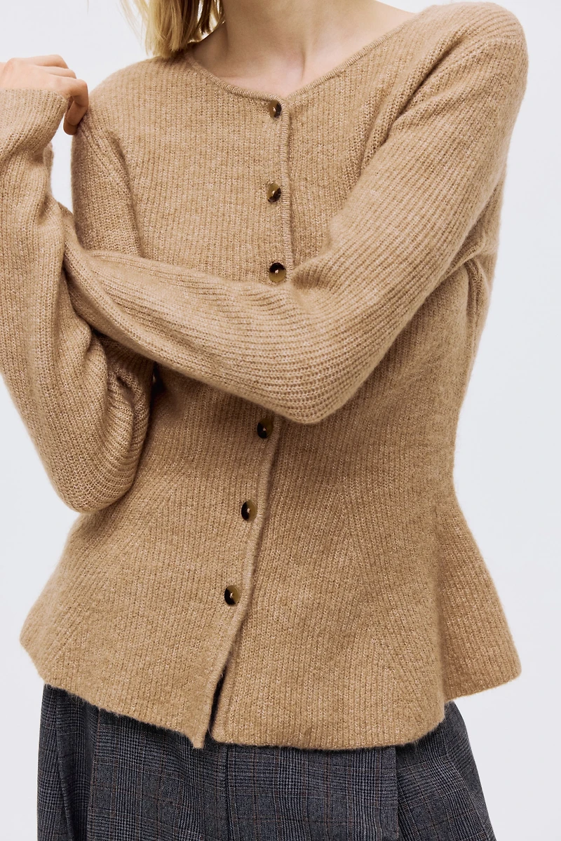 Gilet péplum en tricot côtelé