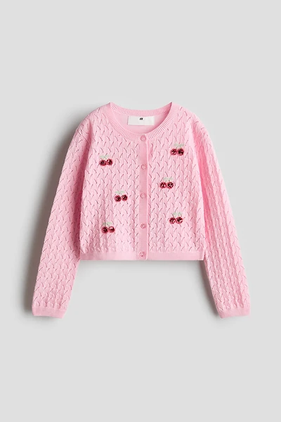 Chandail en tricot pointelle avec motifs