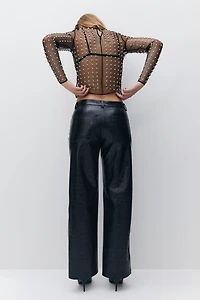 Pantalon en tissu enduit