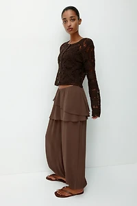 Pantalon en mousseline avec jupe superposée