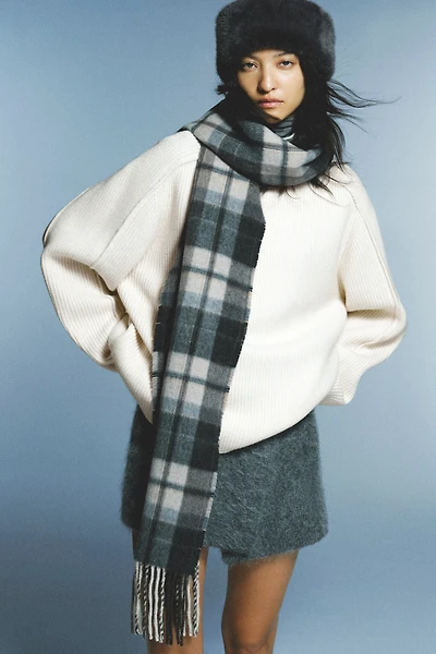 Chandail en tricot côtelé à col cheminée