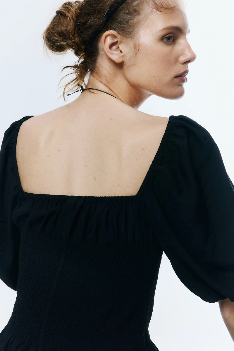 Robe à taille smockée
