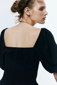 Robe à taille smockée