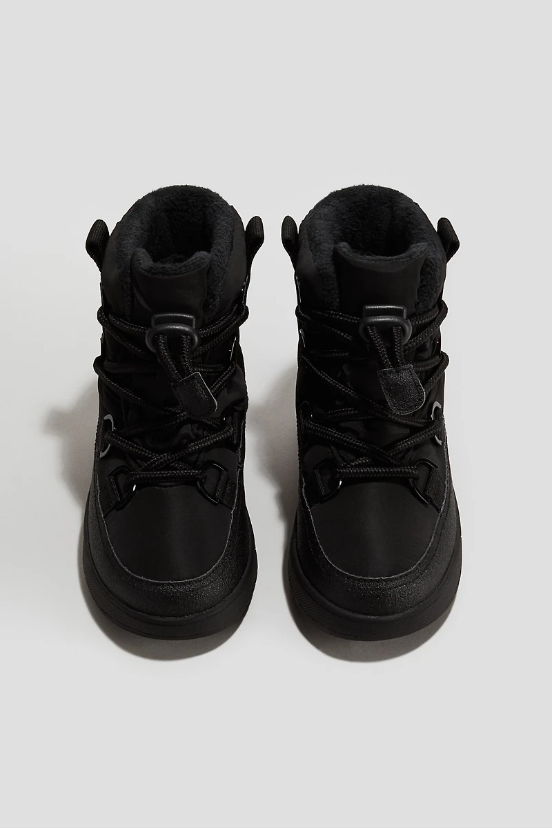 Bottines imperméables et chaudement doublées